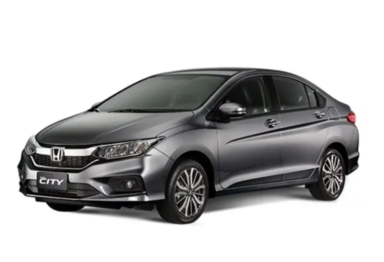 Honda City in metallic grey finish with sleek design and fuel-efficient engine, popular sedan at KK car rental