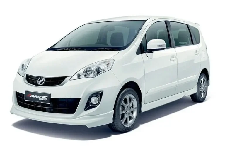 White Perodua Alza 1.5 automatic medium MPV with alloy wheels and spacious seating at KK Car Rental