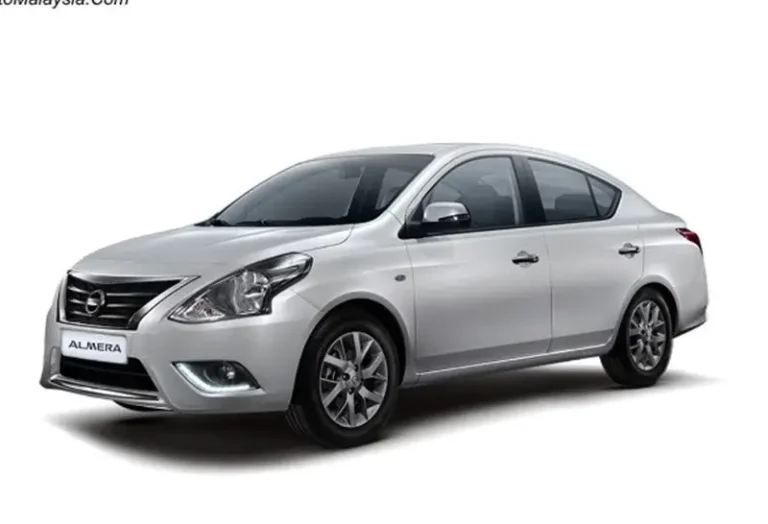 Silver Nissan Almera 1.5 auto sedan with alloy wheels available through KK Car Rental services in Malaysia