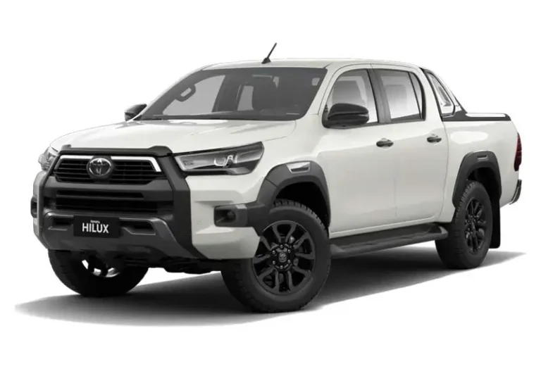 White Toyota Hilux Rogue 2023 pickup truck with black accents and alloy wheels, rugged vehicle from KK car rental