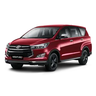 Red Toyota Innova MPV with modern styling and eight-seater family capacity available at KK Car Rental